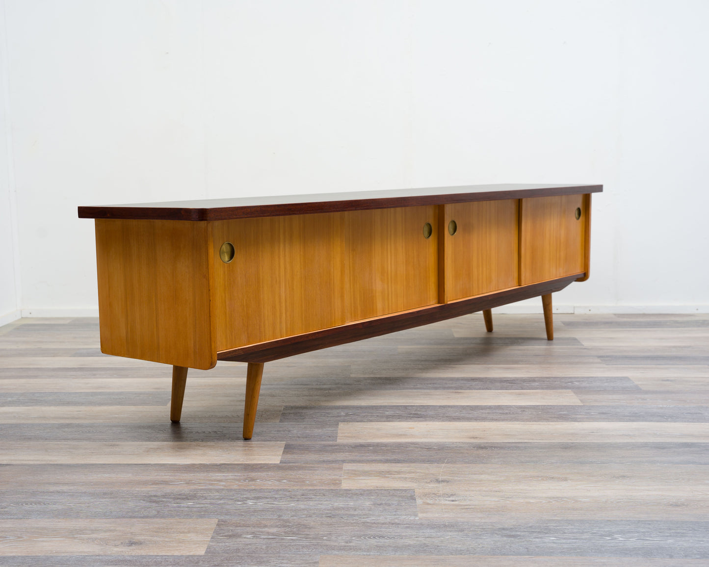 1950s lowboard in ash, surface with black Resopal. Professionally restored