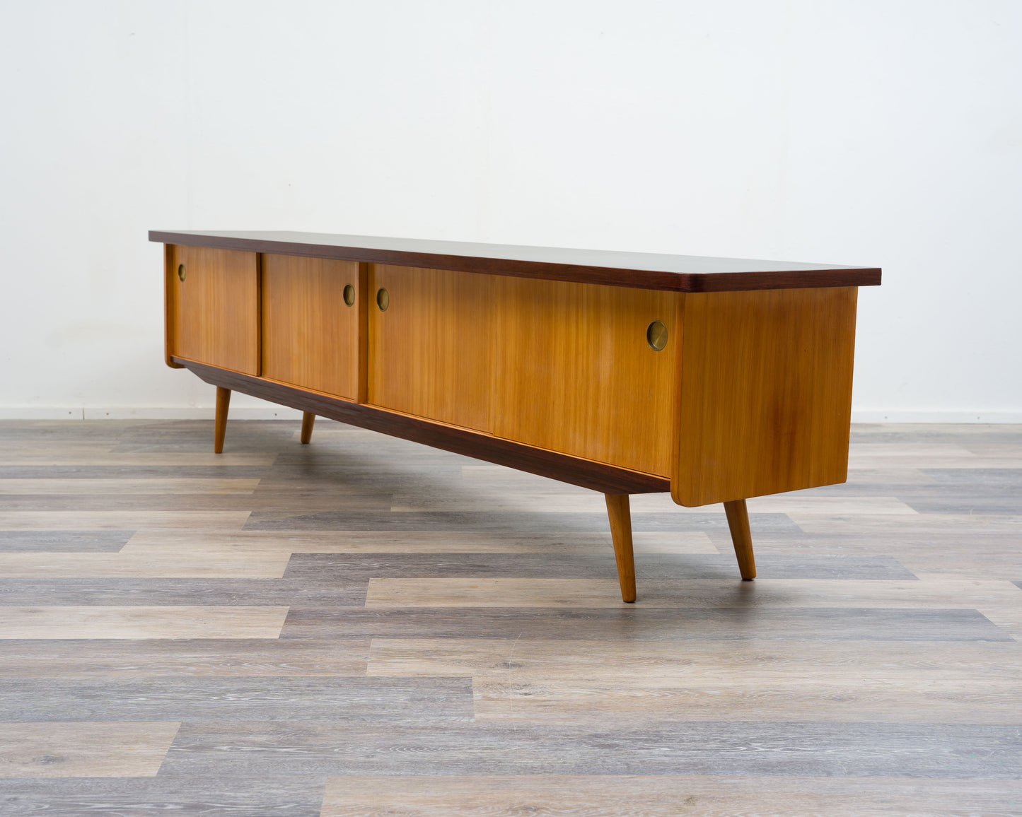 1950s lowboard in ash, surface with black Resopal. Professionally restored