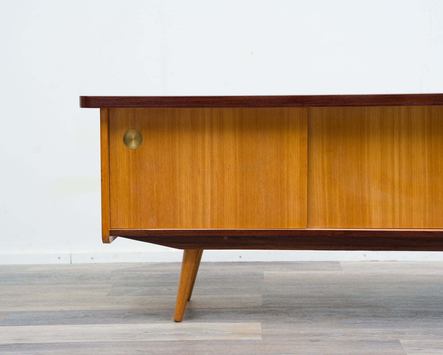 1950s lowboard in ash, surface with black Resopal. Professionally restored