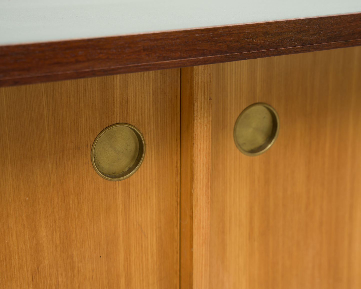 1950s lowboard in ash, surface with black Resopal. Professionally restored