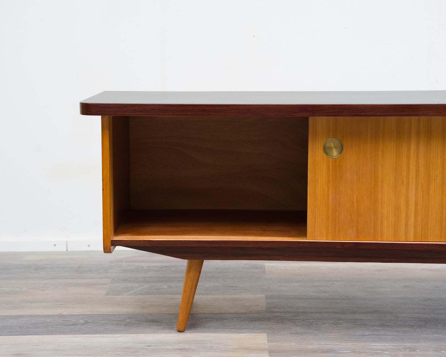 1950s lowboard in ash, surface with black Resopal. Professionally restored