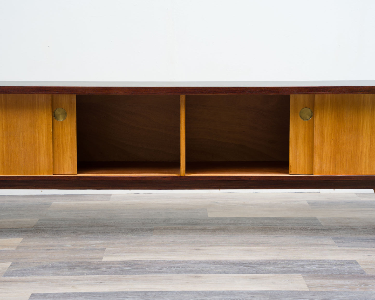 1950s lowboard in ash, surface with black Resopal. Professionally restored