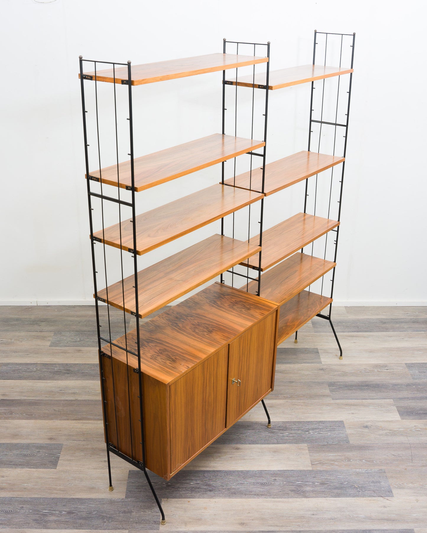 Freestanding shelf, black metal ladders, 60s