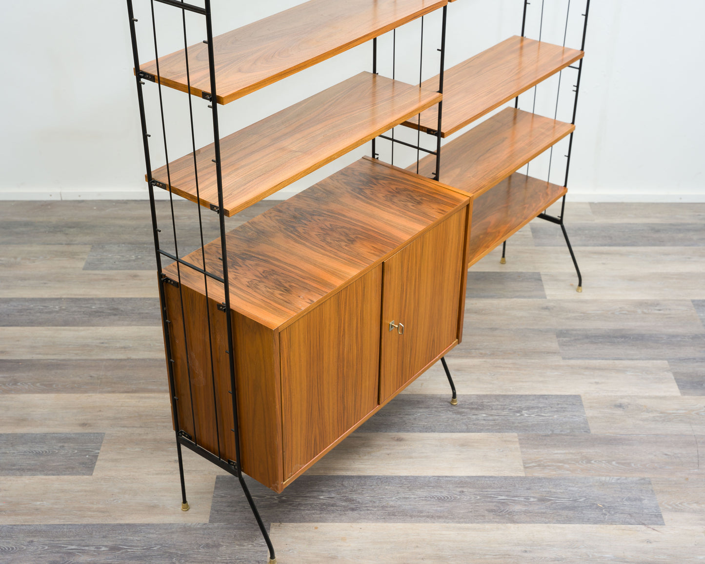 Freestanding shelf, black metal ladders, 60s
