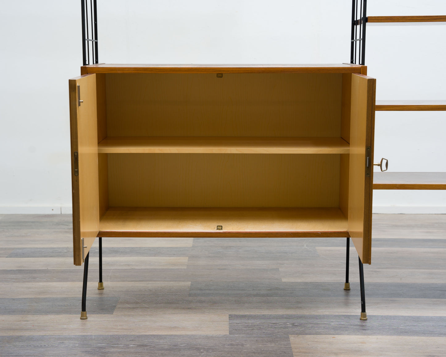 Freestanding shelf, black metal ladders, 60s