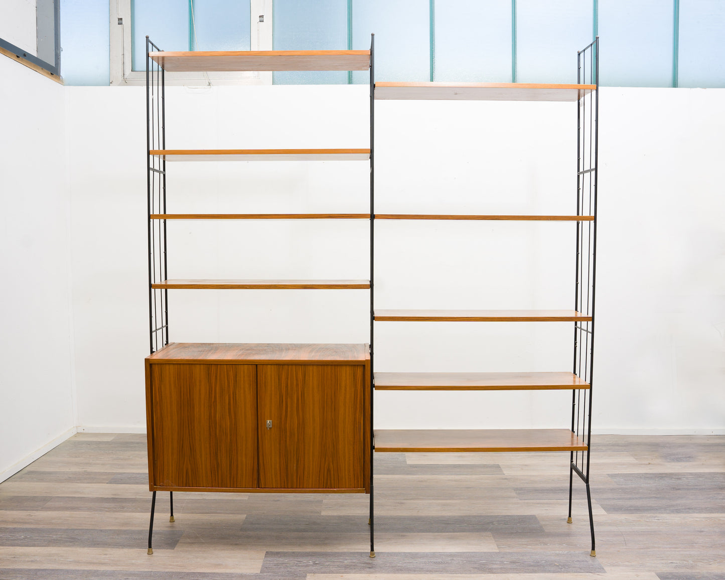 Freestanding shelf, black metal ladders, 60s