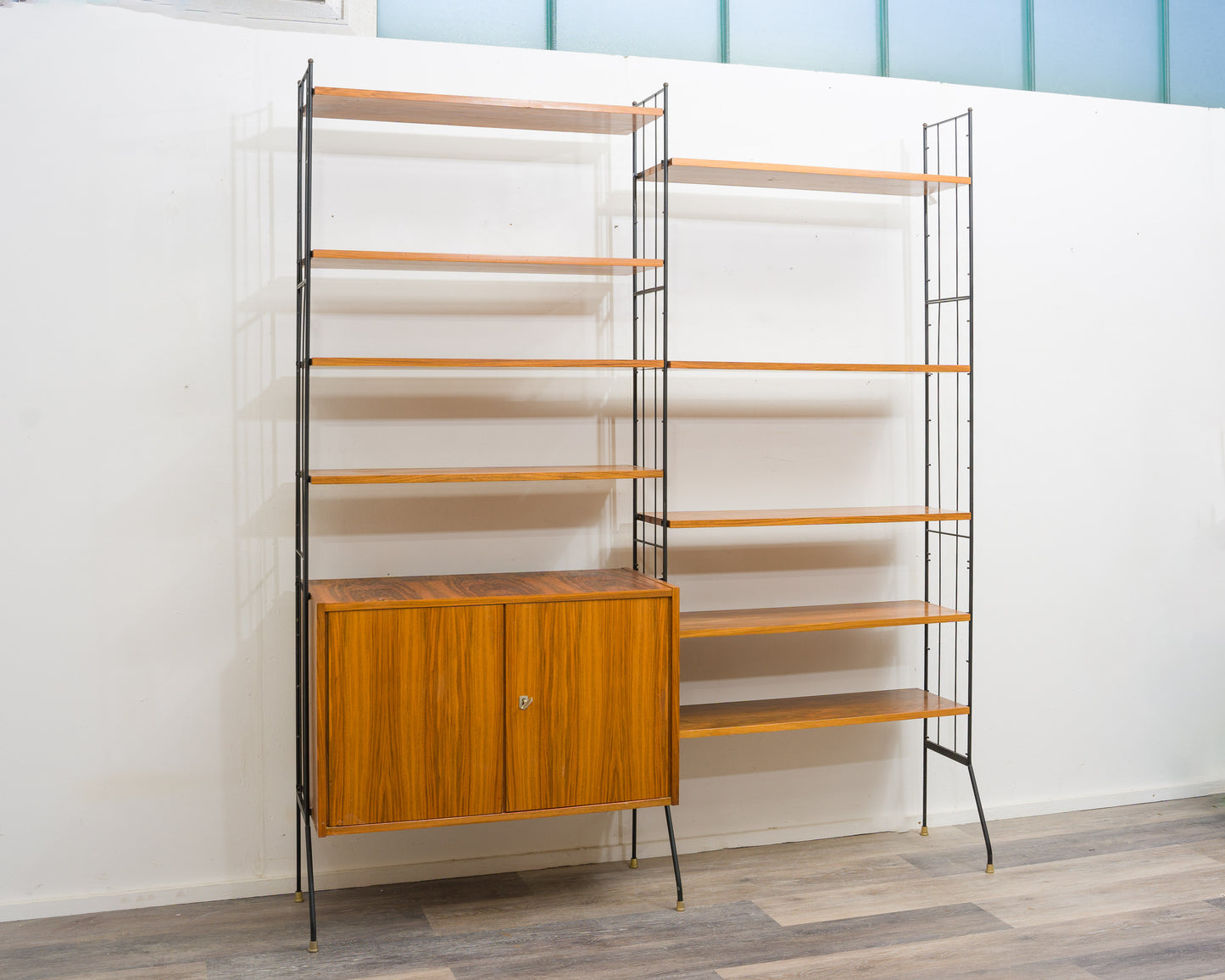 Freestanding shelf, black metal ladders, 60s
