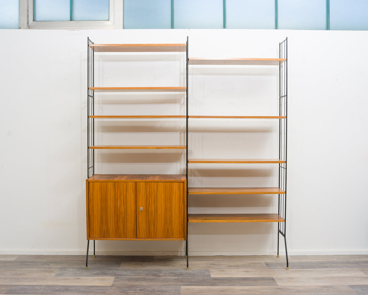 Freestanding shelf, black metal ladders, 60s