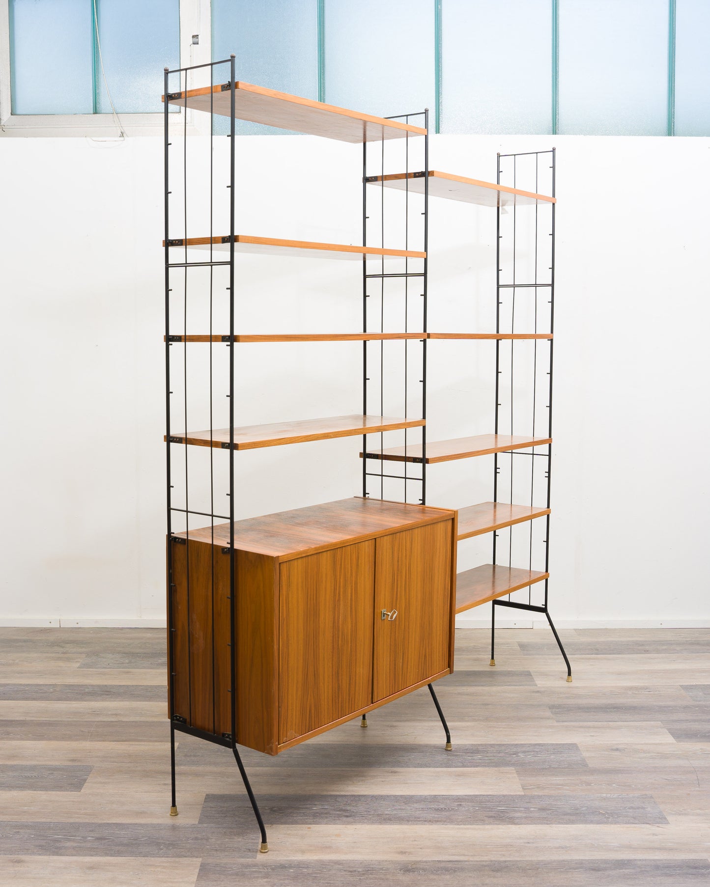 Freestanding shelf, black metal ladders, 60s