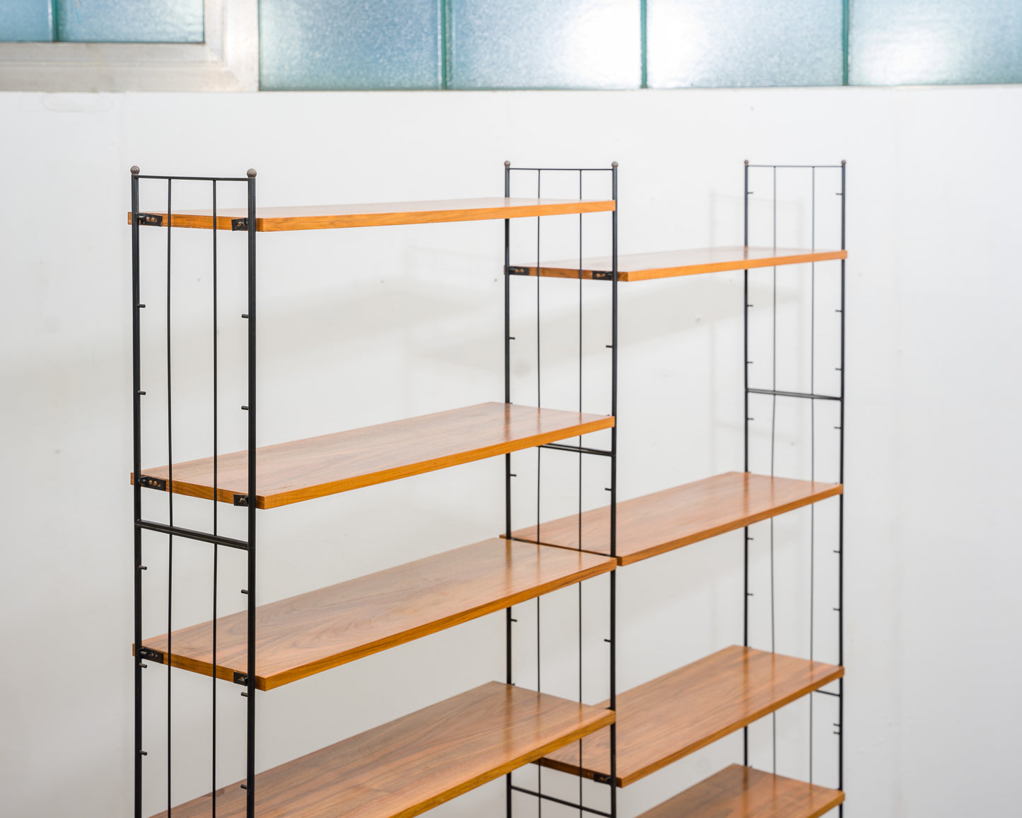 Freestanding shelf, black metal ladders, 60s