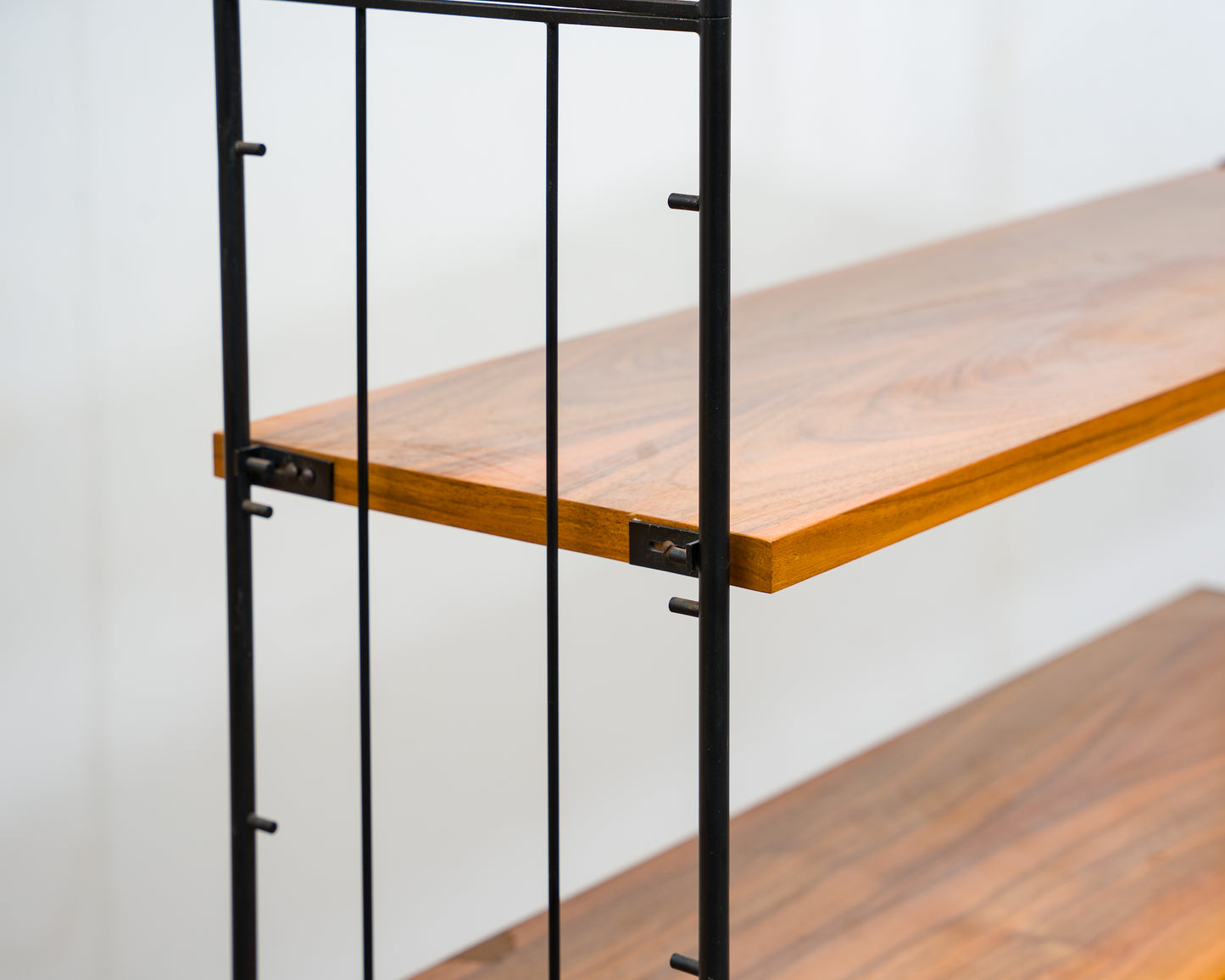 Freestanding shelf, black metal ladders, 60s