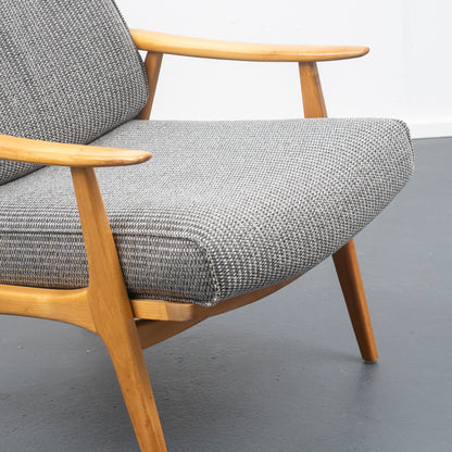 Fauteuil en merisier des années 50 restauré