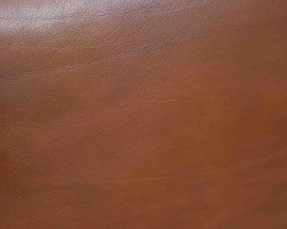 Ledersessel, 70er Jahre, Hersteller Sitag, cognacbraunes Leder.