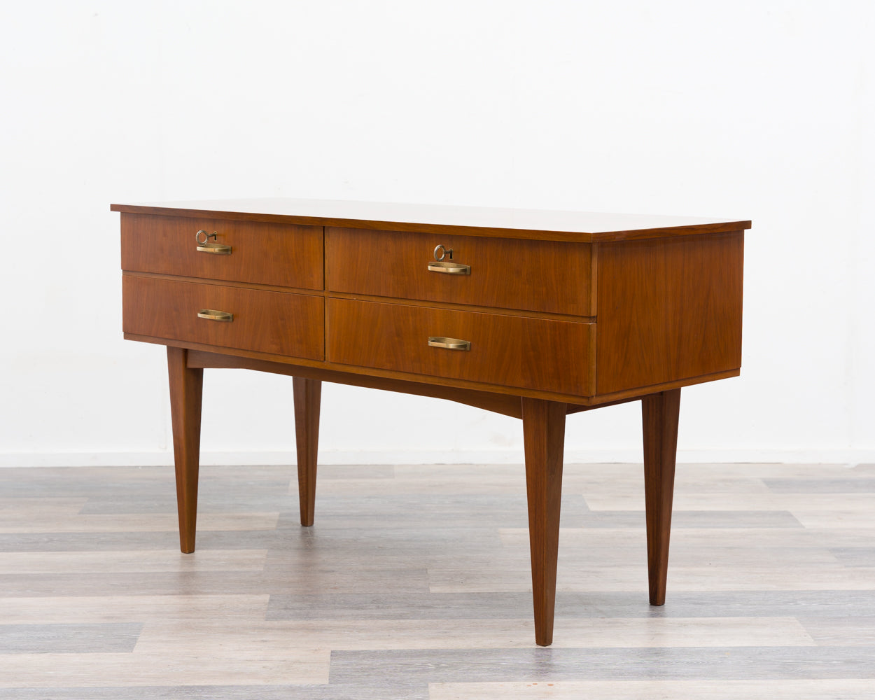 Sideboard/chest of drawers from the 1950s in walnut. Excellent original condition.