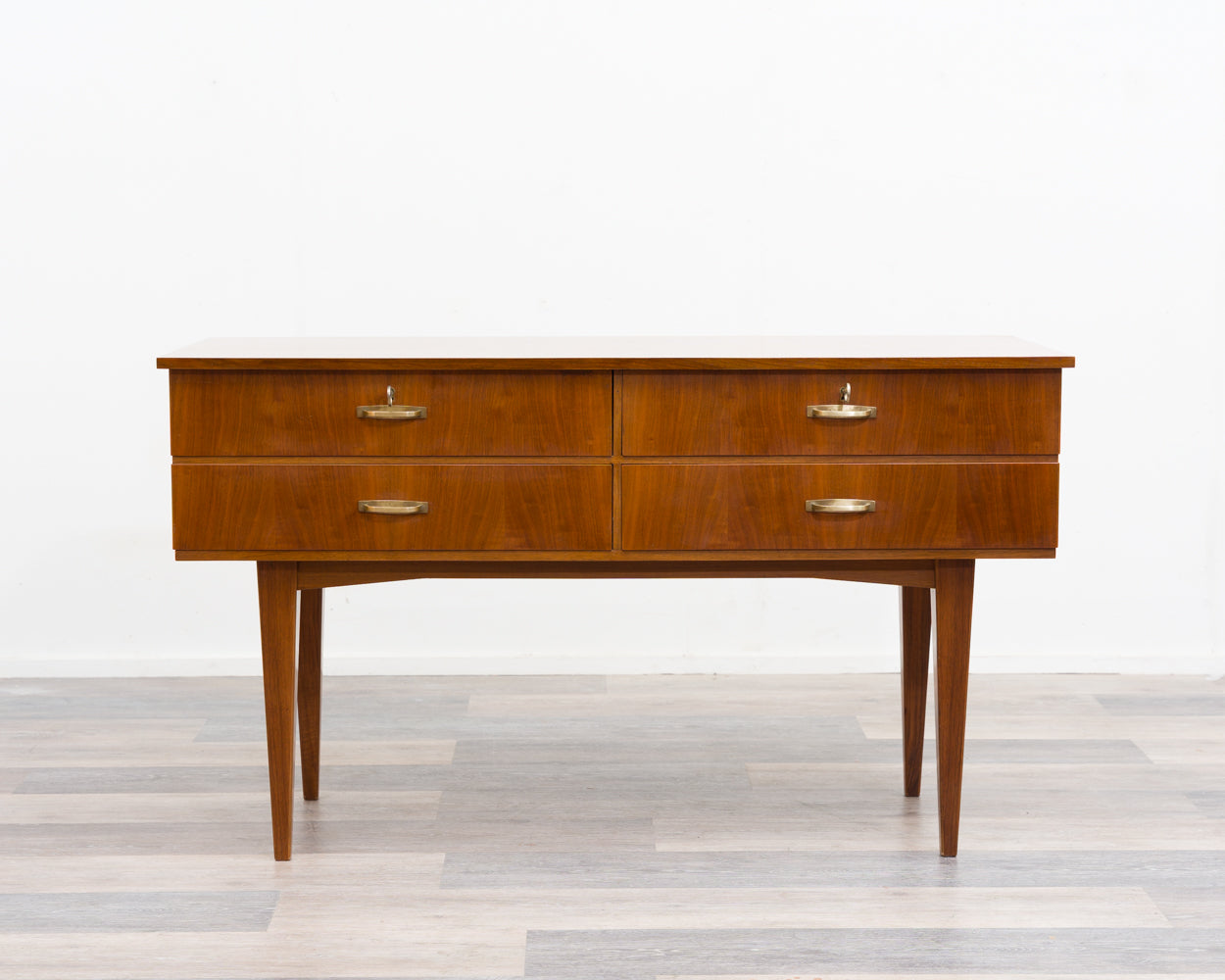 Sideboard/chest of drawers from the 1950s in walnut. Excellent original condition.