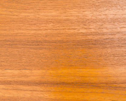 Teak sideboard from the 1960s with grooved drawers.