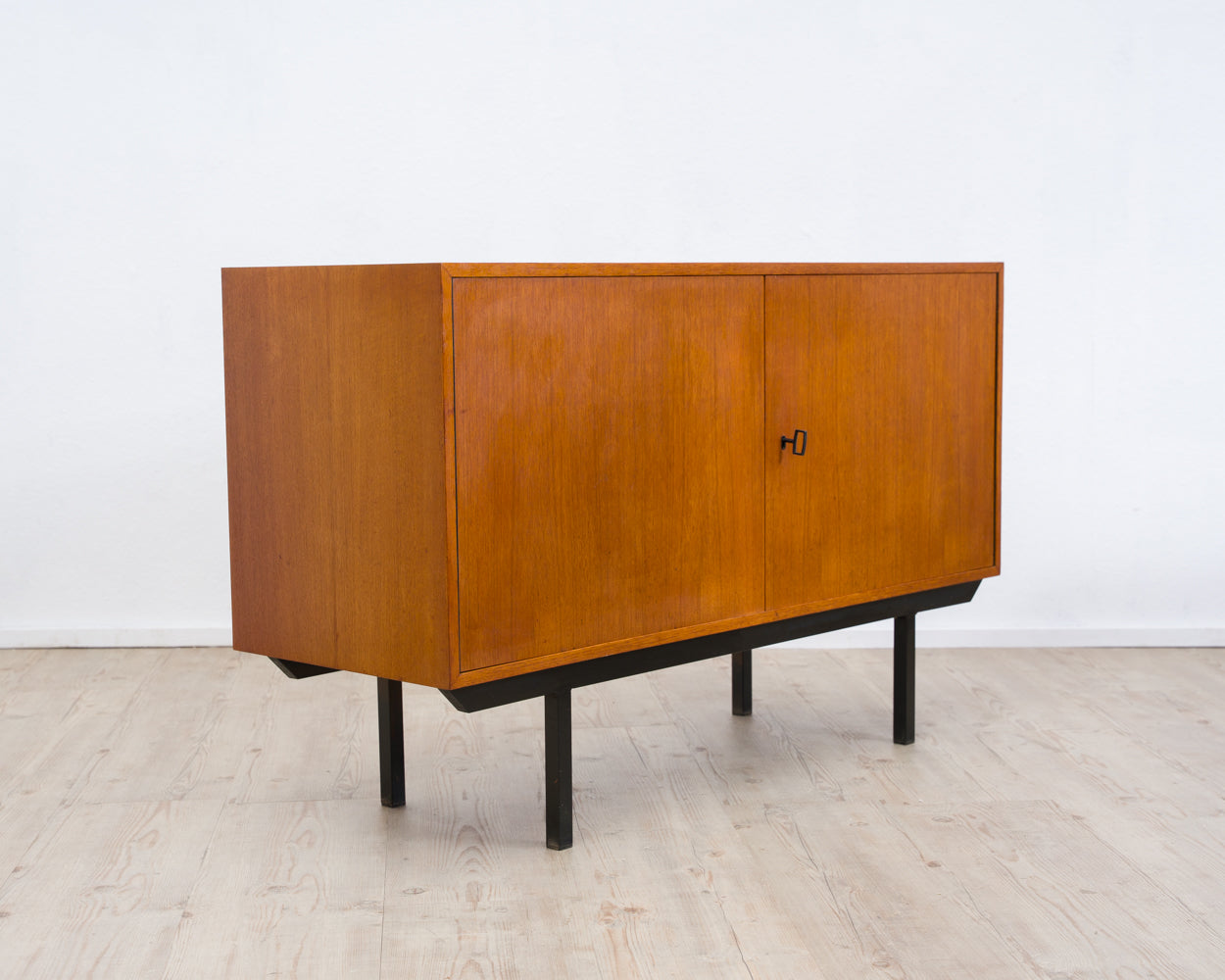 Two-door teak chest of drawers from the 60s with black metal frame