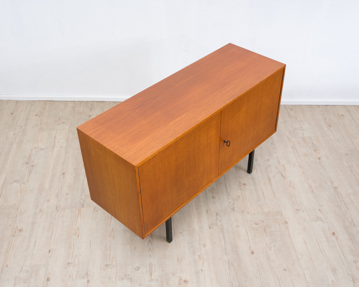 Two-door teak chest of drawers from the 60s with black metal frame