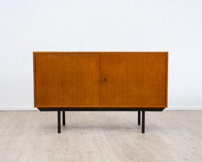 Two-door teak chest of drawers from the 60s with black metal frame