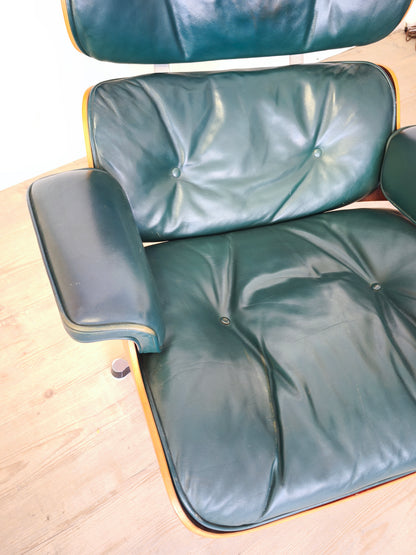 Original Herman Miller Eames Lounge Chairs with ottoman. In avocado green leather
