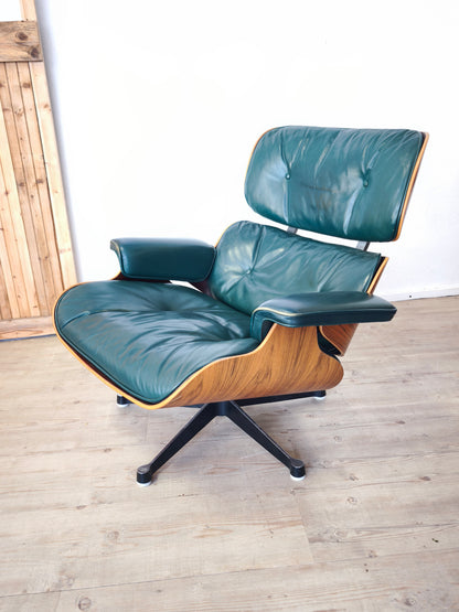 Original Herman Miller Eames Lounge Chairs with ottoman. In avocado green leather