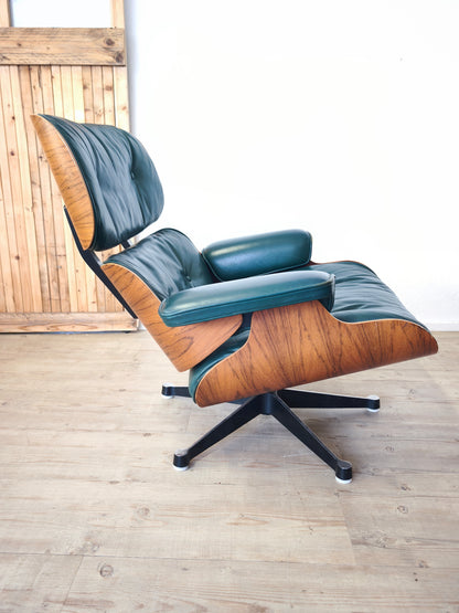 Original Herman Miller Eames Lounge Chairs with ottoman. In avocado green leather